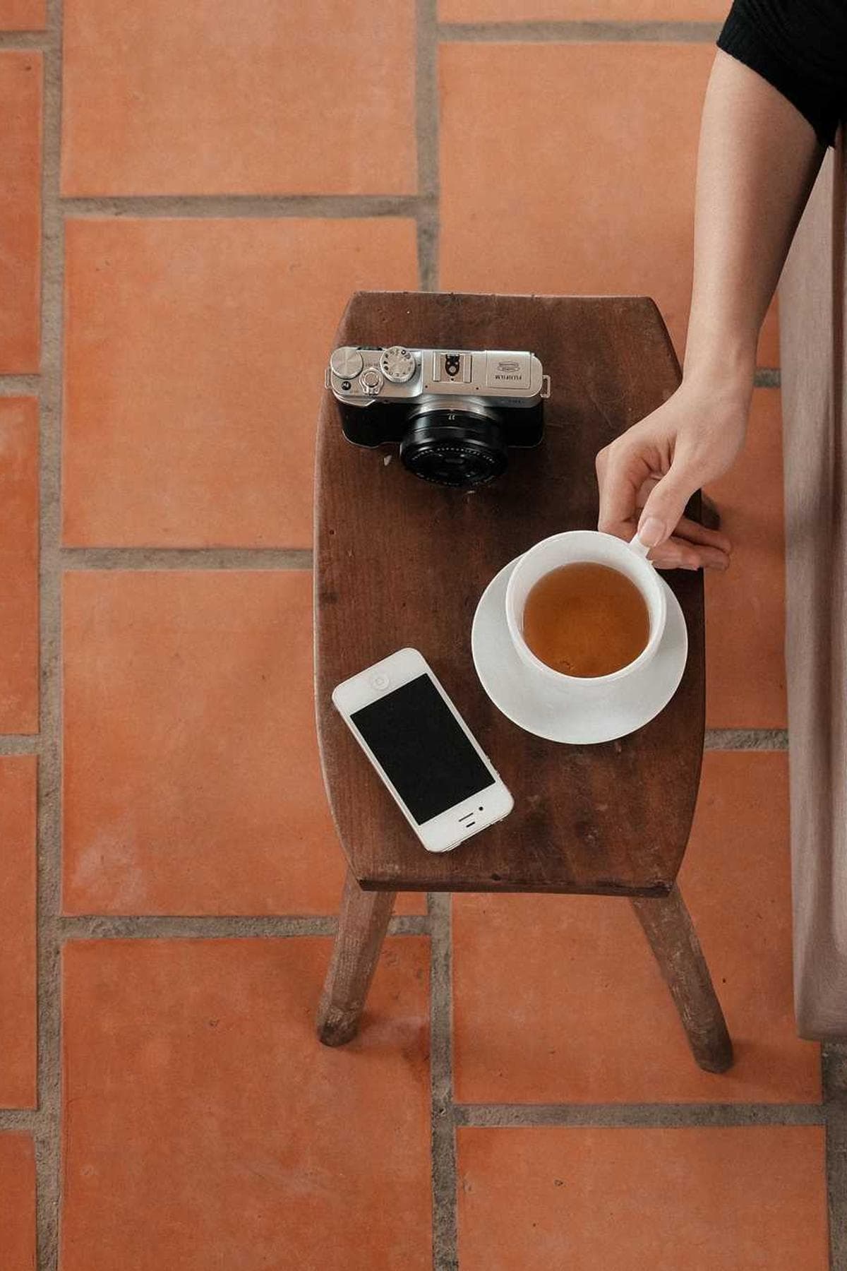 A high-angle shot of a bustling, modern cityscape at dusk