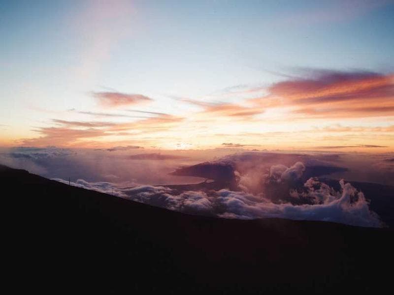 Modern diverse team collaborating around a glowing interface