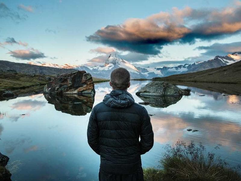 A single ceramic vase on a wooden table