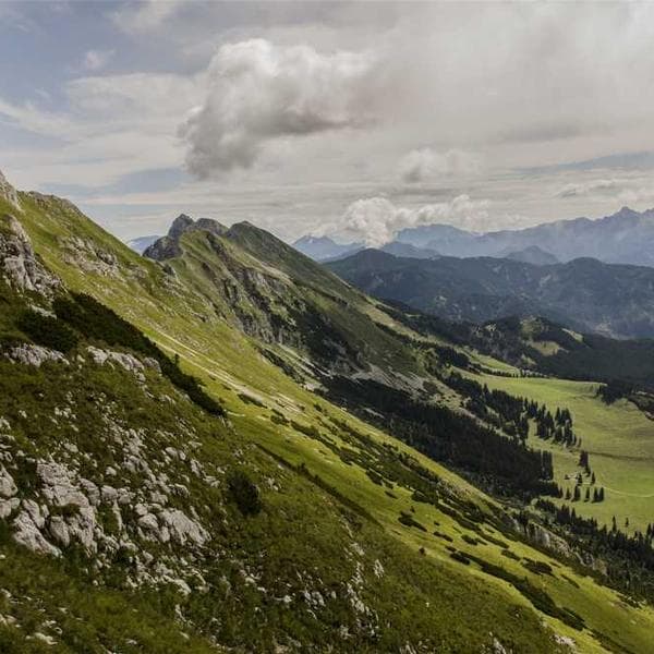 A tight-knit fishing community mending nets by the sea