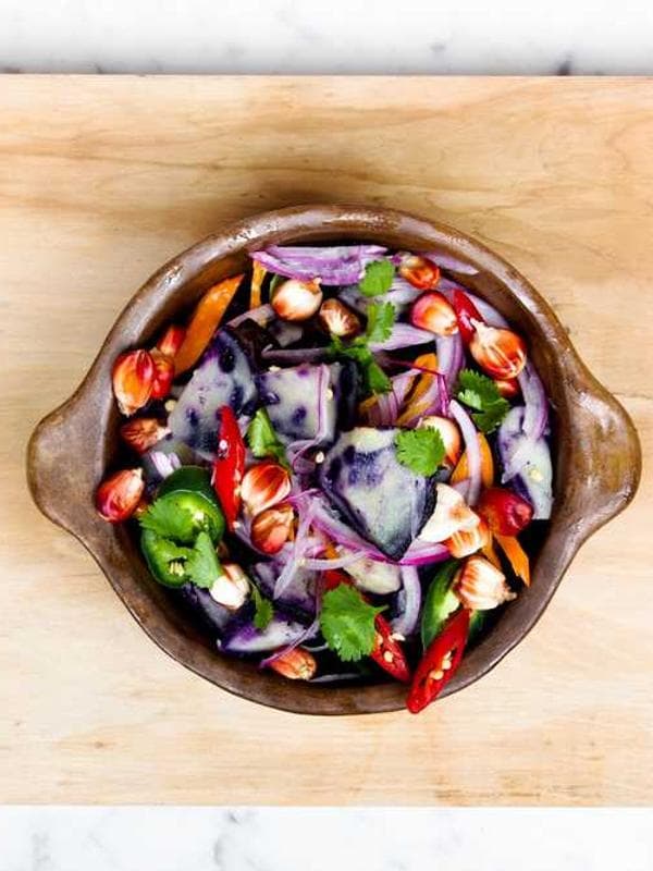 Retro-style kitchenware like a colorful mixer and canisters